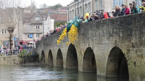 Bradford on Avon Town Council Hundreds of ducks launched from Town Bridge into the River Avon