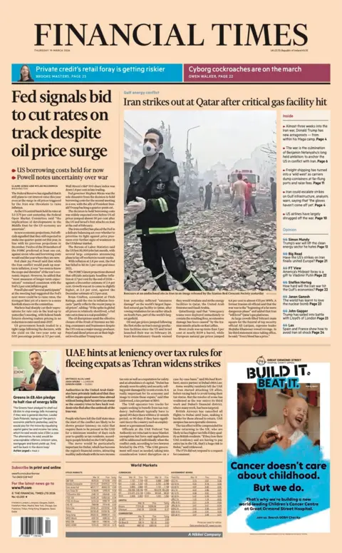 The headline on the front page of the Financial Times reads: "Fed signals bid to cut rates on track despite oil price surge."