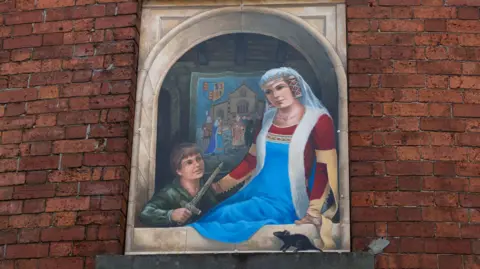 North Yorkshire Council A window painting depicting Queen Philippa and a young boy with a sword.