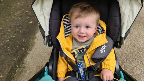 Lewis & Zoe Steeper Oliver Steeper in a pram