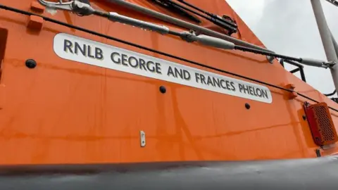 Andrew Turner/BBC George and Frances Phelon lifeboat name plaque