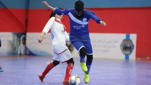 Manozh Noori Manozh Noori wearing a face mask to hide her identity while playing a match in Afghanistan