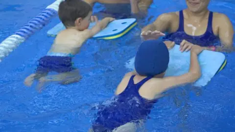 Getty Images Children learning to swim.