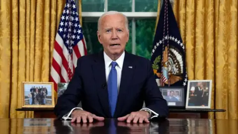 Getty Images US President Joe Biden speaks in the Oval Office on 24 July 2024