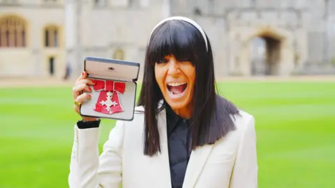 Claudia Winkleman accepting her honour at Windsor Castle 