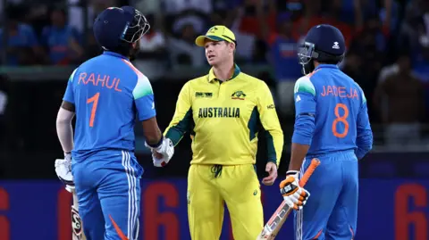 India's KL Rahul and Ravindra Jadeja shake hands with Australia's Steve Smith during the Champions Trophy earlier in 2025