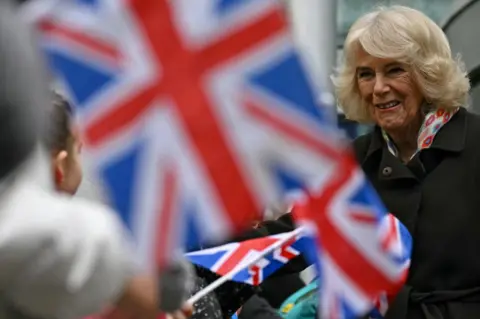 PA Media Queen arrives at the Great Western Hospital with Union Jacks flags flying