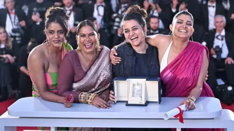 Kani Kusruti, Chhaya Kadam and Payal pose after receiving the Grand Prix Award for 'All We Imagine As Light' at the closing ceremony of the 77th Cannes Film Festival in Cannes on May 25, 2024.・Kapadia, Divya Prabha