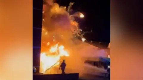 Footage shows the fire at Golders Green after ambulances were set on fire