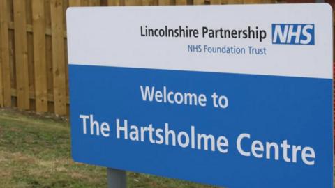 A sign for The Hartsholme Centre in Lincoln
