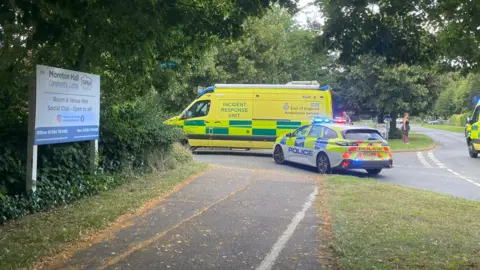 Rachael McMenemy/BBC Emergency vehicles arriving at Lawson Place