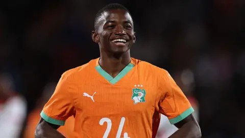 Bazoumana Toure playing for Ivory Coast