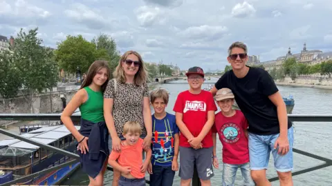 PA Gillie and Matt pictured here with their five children, Gracie, Josiah, Caleb, Joel, and Noah 