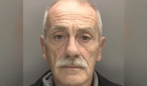 West Midlands Police Gary Jefferis, seen in a police mugshot.