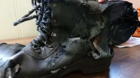 HSE Martin Hill's damaged boot