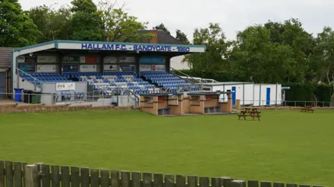 Oli Constable/BBC A view of the main stand at Sandygate, the home of Hallam FC and world's oldest football ground.