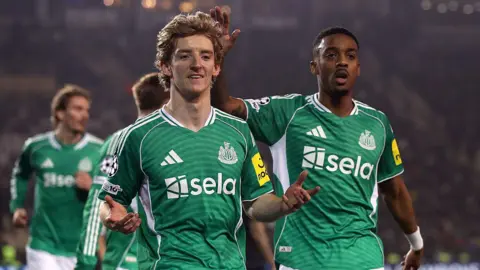 Anthony Gordon celebrates after scoring for Newcastle United against Qarabag on 18 February, 2026