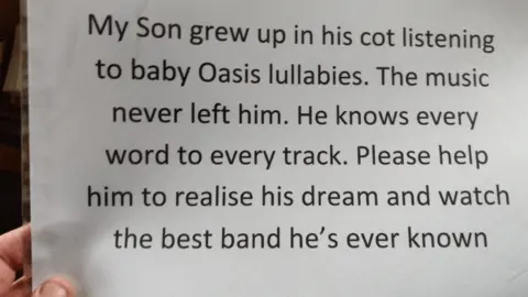 Rev Huw Thomas A typed notice on white paper asking for tickets to see Oasis