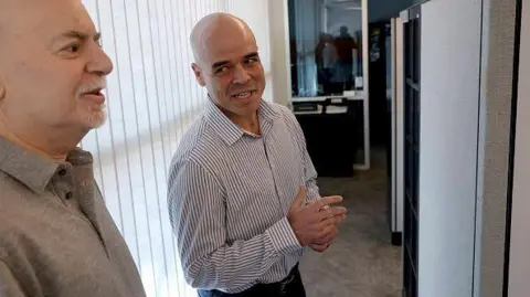 Getty Images Former Clark County Public Administrator Robert Telles, right, talks to Review-Journal reporter Jeff German in his Las Vegas office in 2022