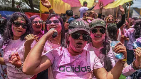 Getty Images Hindus in Kenya take part in the 'Holi' festival, a celebration of colors and the arrival of spring in Indian culture on March 1, 2026 in Nairobi, Kenya.