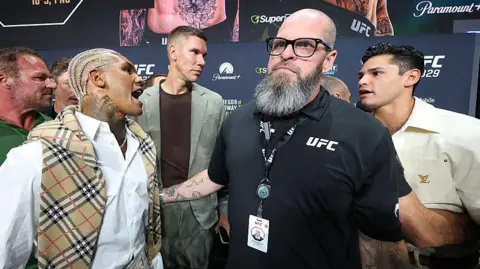 Conor Benn confronts Ryan Garcia at the ceremonial weigh-in for UFC 329 on 10 July 2026