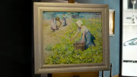 Joanna Hawkins/BBC Brightly-coloured artwork depicting women in a field with one placing items in a basket at her side