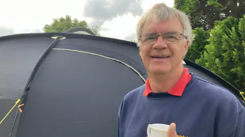 Tim Walker with his tent is offering to host visitors to Barrow