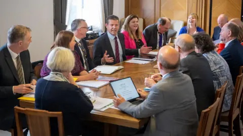 Matthew Horwood/Welsh government Rhun ap Iorwerth speaks at his first cabinet meeting with 