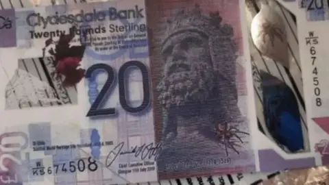 West Yorkshire Police A note that appears to be from Clydesdal Bank, with a large 20 on it, holograms and signature