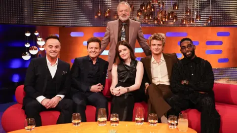 Host Graham Norton with (front row left to right) Ant McPartlin, Declan Donnelly, Claire Foy, Joe Keery and Tinie Tempah during filming for the Graham Norton Show, at BBC Studioworks 6 Television Centre, Wood Lane, London, to be aired on BBC One on Friday evening. 