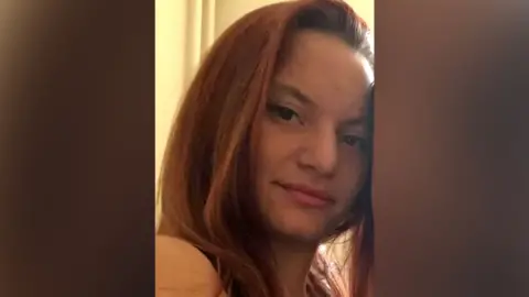 Met Police Sheryl Wilkins - a young woman with long, brown hair
