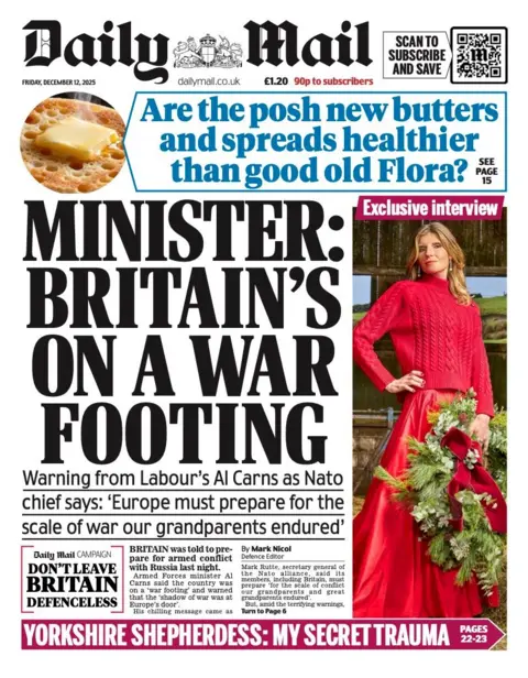 The headline on the front page of the Mail reads: “Minister: Britain's on a war footing".