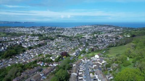 Aerial shot overlooking coastal town of Brixham in Devon