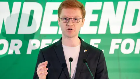 Green MSP Ross Greer talking