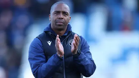 Walsall interim boss Darren Byfield applauds supporters