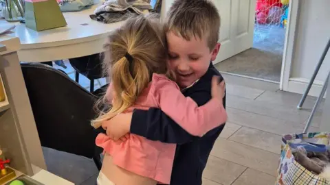 Family handout Ayda and her brother