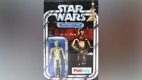 Hansons Auctioneers Star Wars figure C-3PO with solid limbs, 1978, by the UK maker Palitoy. Estimated between £1,000-£1,500 and sold for £1,700 at auction in Derbyshire on 5 May 2026.