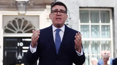 EPA New British Prime Minister Andy Burnham delivers a speech outside 10 Downing Street in London, Britain, 20 July 2026. Burnham became British Prime Minister after Keir Starmer resigned.