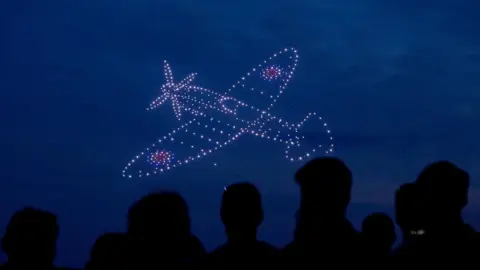 Drone lights creating image of spitfire plane