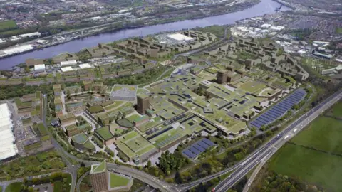 A CGI depicting an aerial view of how Metro Riverside will look. The shopping centre is covered in greenery and has solar panels on its roof. Buildings and homes are located around the centre and near the River Tyne.