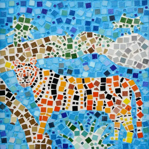Creative Futures A brightly coloured mosaic featuring a tiger against a blue background with green plant life