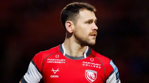 Tomos Williams on the pitch during a Gloucester match