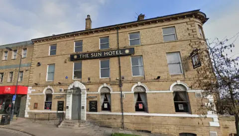 Google the Sun Hotel pub, a brown brick building