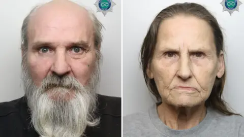 A composite image comprised of two police mugshots. On the left is a man with a long grey beard, and on the right a woman with shoulder length brown hair