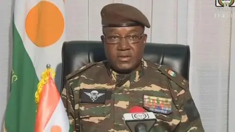 AFP Leader of Niger Abdourahamane Tchiani dressed in military camouflage gear.