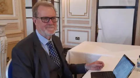 LDRS Planning inspector Phillip Ware with his laptop at the public inquiry in the Imperial Hotel, Blackpool.