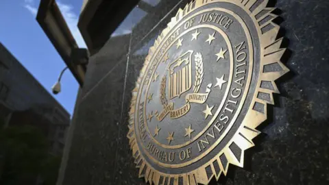 Getty Images A picture of the FBI seal on the side of a building