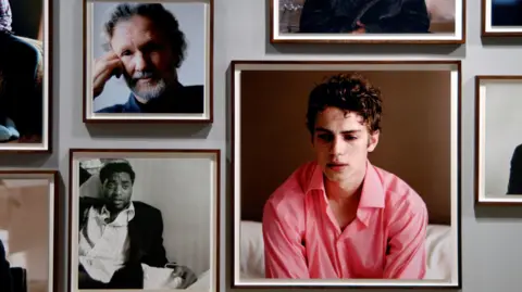 Baltic Centre for Contemporary Art A gallery wall with numerous photographs of men