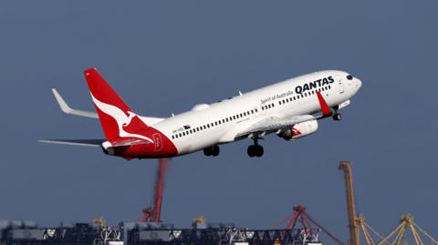  Qantas aircraft taking off at Sydney's Kingsford Smith international airport.