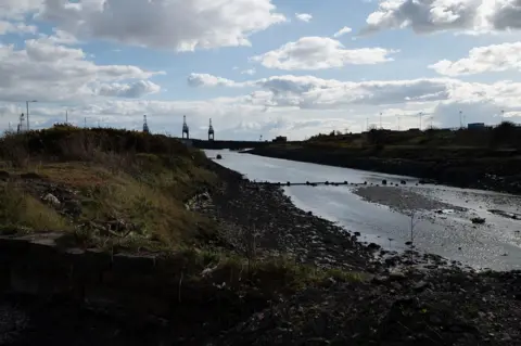 Jon Pountney The River Afan with a view of industrial structures in the background